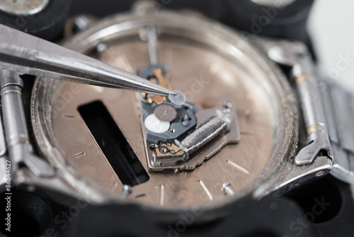 Tweezers Repairing Wrist Watch