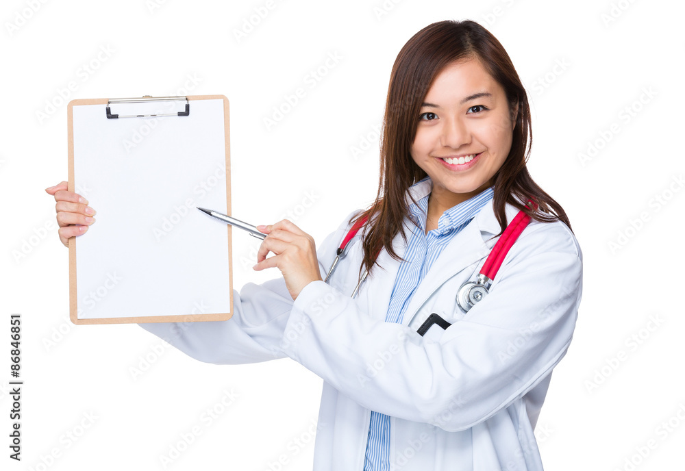 Doctor woman with pen point to clipboard Doctor woman with pen point to clipboard