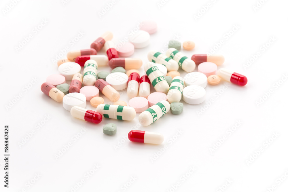 diferent Tablets pills capsule heap mix therapy drugs doctor flu