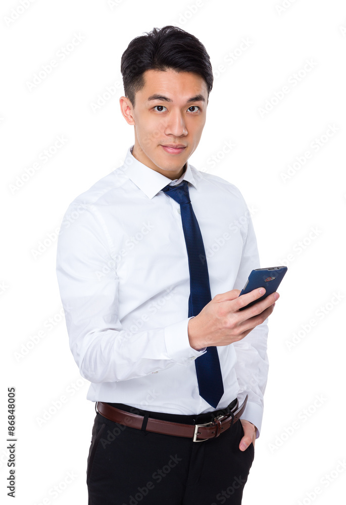 Young businessman use of the mobile phone Young businessman use of the mobile phone