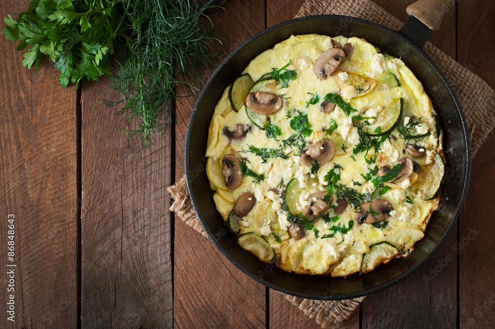 Frittata with mushrooms, zucchini and cheese Frittata with mushrooms, zucchini and cheese