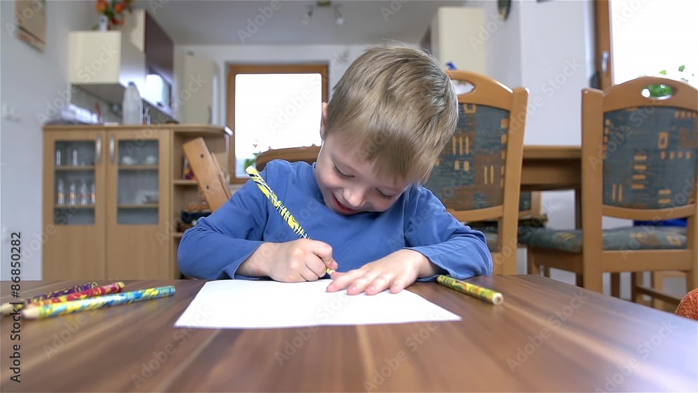 Wide Shoot Sliding While Kid Drawing On Table In Slow Motion Wide Shoot Sliding While Kid Drawing On Table In Slow Motion