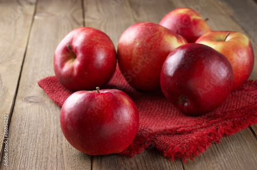 Red apples on napkin