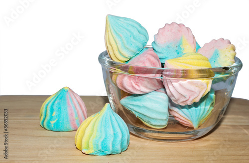 фотографія Sweet turnovers in a glass bowl on wooden