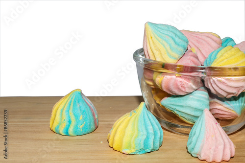 Obraz na plátně Sweet turnovers in a glass bowl on wooden