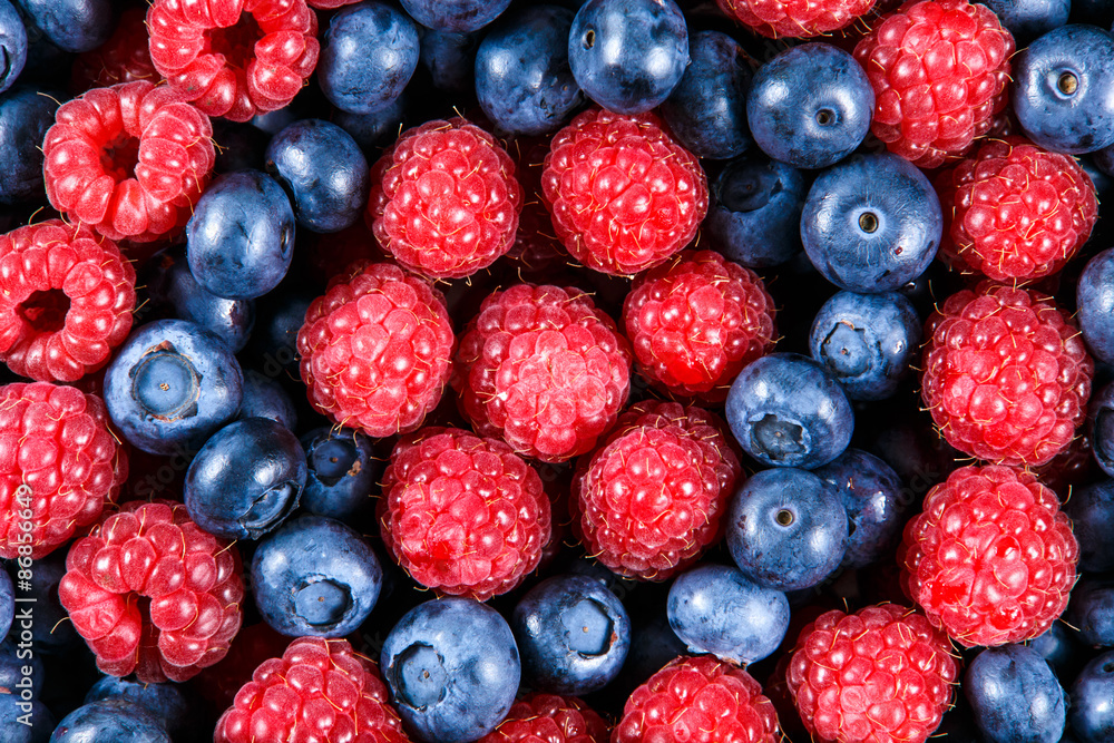 Clouse up Fresh Organic Blueberries and Raspberries. Rich with vitamins Background, texture Clouse up Fresh Organic Blueberries and Raspberries. Rich with vitamins Background, texture