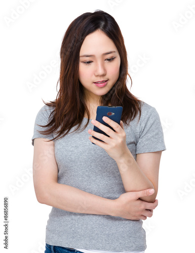 Asian young woman check on the cellphone