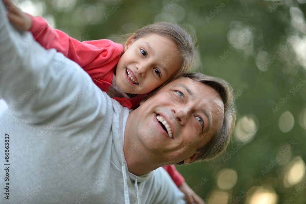 Father with daughter in summer park Father with daughter in summer park