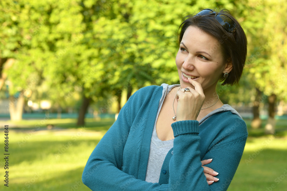 Happy woman in summer park Happy woman in summer park