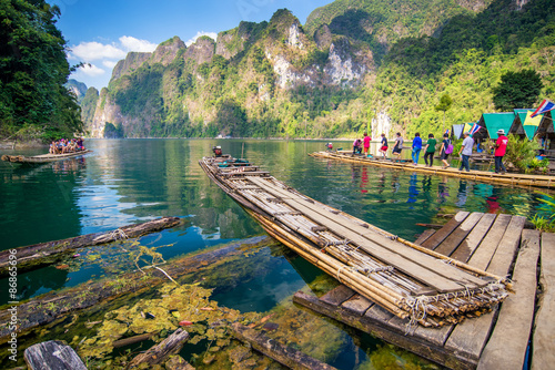 Bamboo rafting on river, photo