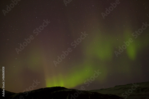 Different colors of northern lights in Iceland