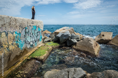 Photography Mediterranean Sea seen from breakwater on the Barceloneta beach in Barcelona, Sp