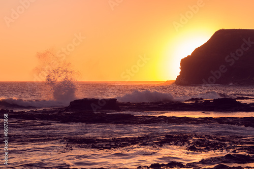 Golden sunset at Curio Bay