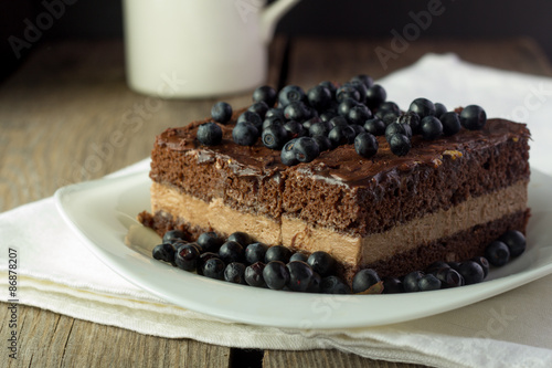 Chocolate cake with blueberry closeup