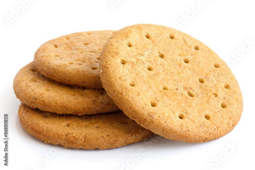 Foto Stack of sweetmeal digestive biscuits isolated on white.