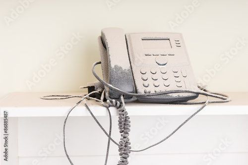 Bild auf Leinwand Landline telephone covered in white paint