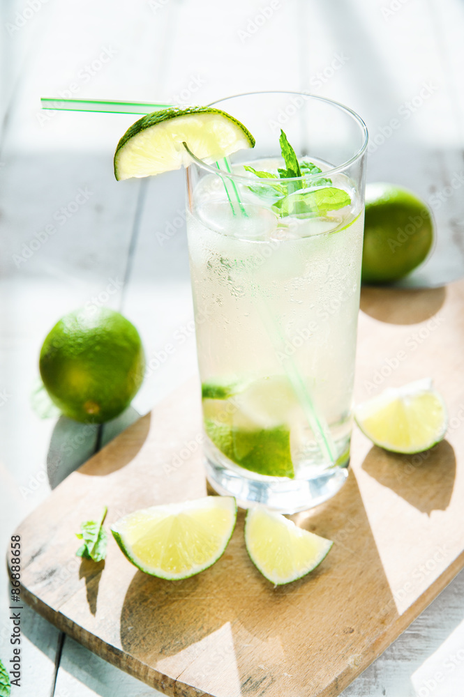 Glass of water with ice and lime Glass of water with ice and lime