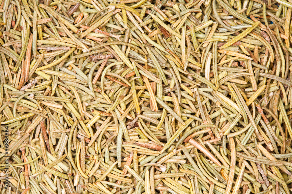 Dried rosemary as background texture.