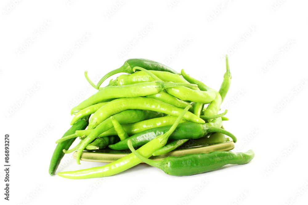 fresh green chili pepper on pure white background