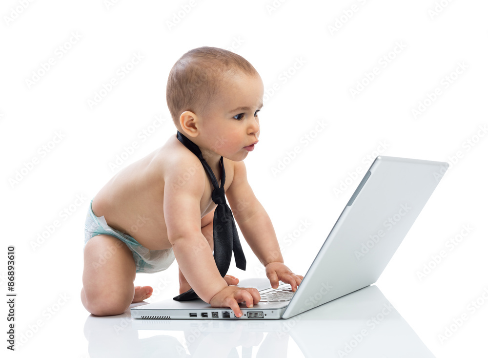 Little baby businessman working on the computer Little baby businessman working on the computer