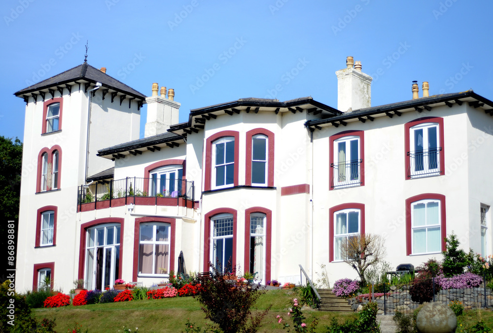 Obraz premium Bryn Hedd is a large Victorian villa built in the Italianate style. The British prime minister William Ewart Gladstone and his family stayed here during their firth visit to Penmaenmawr in 1855.