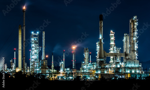Oil refinery at night photo