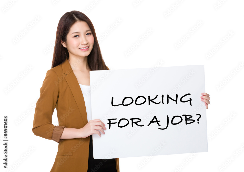 Businesswoman hold with palcard and presenting phrase of looking Businesswoman hold with palcard and presenting phrase of looking