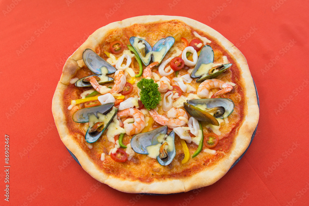 delicious hot seafood pizza from oven