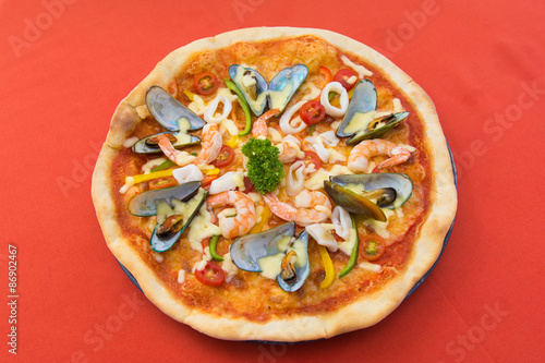 delicious hot seafood pizza from oven