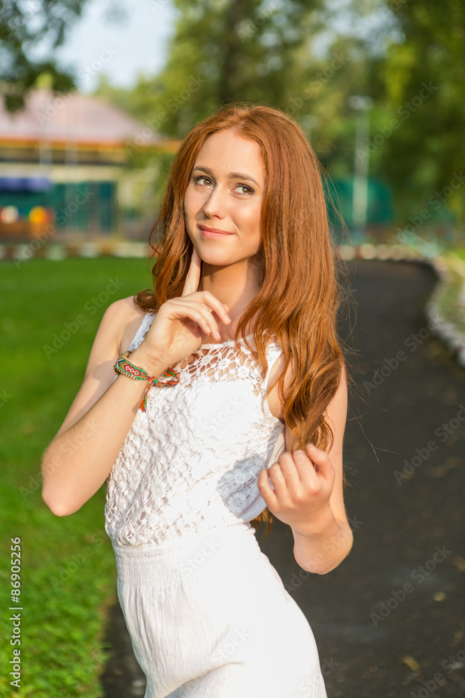 Naklejka premium Portrait of red hair girl.