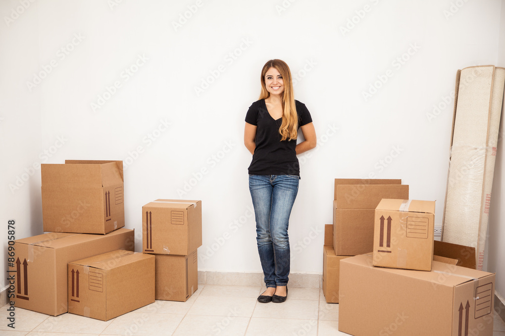 Cute girl moving into her new home Cute girl moving into her new home