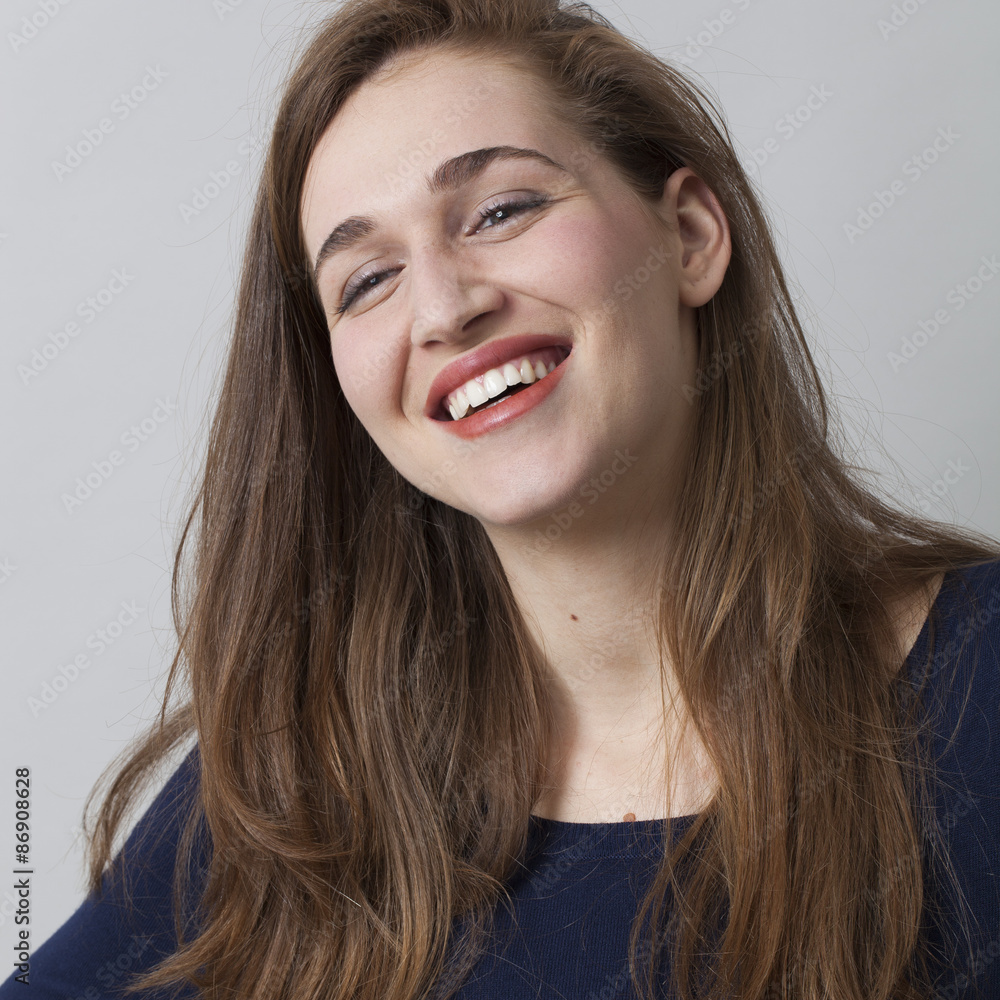 closeup portrait of beautiful smiling 20s woman wearing navy blue sweater, expressing success and wellbeing closeup portrait of beautiful smiling 20s woman wearing navy blue sweater, expressing success and wellbeing