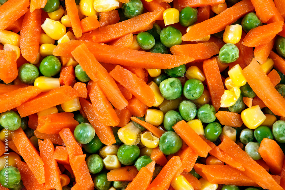 Fresh and Tasty Mix of chopped vegetables close-up as background Fresh and Tasty Mix of chopped vegetables close-up as background