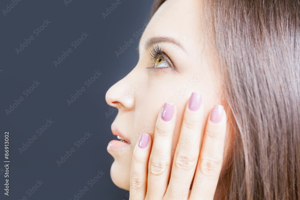 young pretty woman with beautiful makeup and manicure, black background young pretty woman with beautiful makeup and manicure, black background