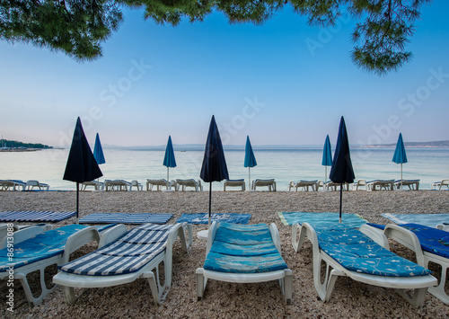 The beach in the morning  in Brela, Croatia. photo