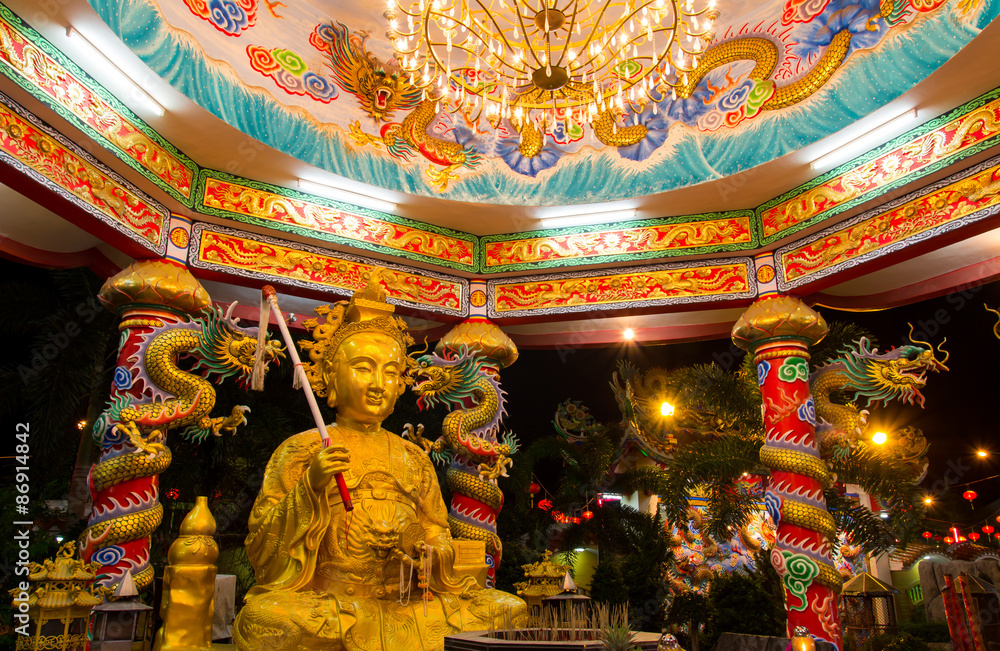 Fototapeta premium The Elegant Dragon on the majestic night sky at chinese temple in Thailand.