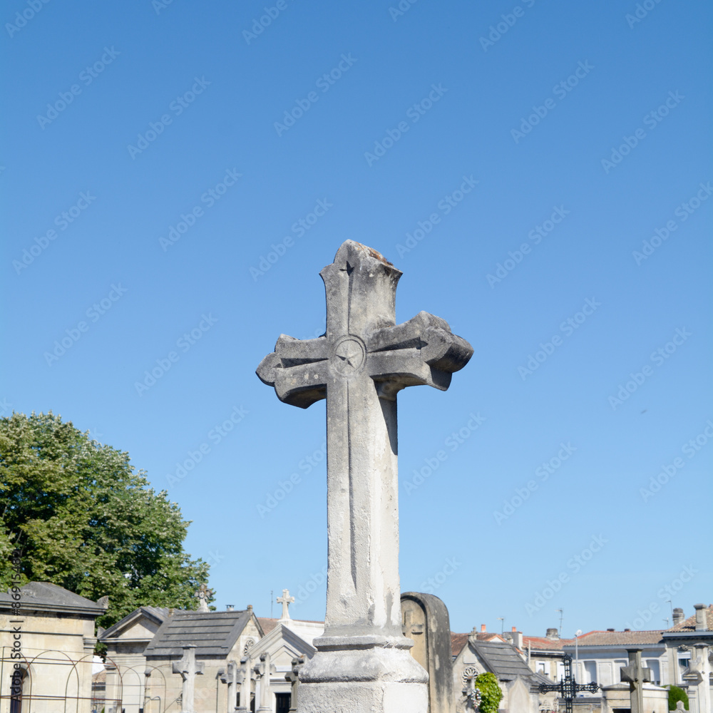 Graveyard cross in cemetery