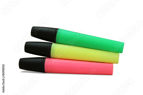 three multi-colored marker