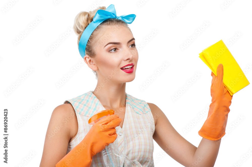 Attractive young blond housewife is doing cleanup Attractive young blond housewife is doing cleanup