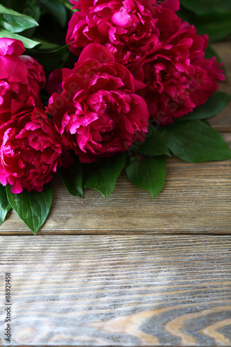 Bunch of peonies on the boards © Olha Afanasieva