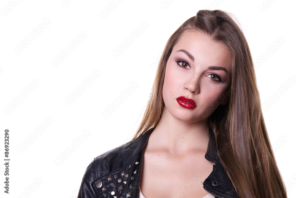 Beautiful girl with a red lipstick dressed in a black leather jacket. Isolated over white background. Copy space. Beautiful girl with a red lipstick dressed in a black leather jacket. Isolated over white background. Copy space.
