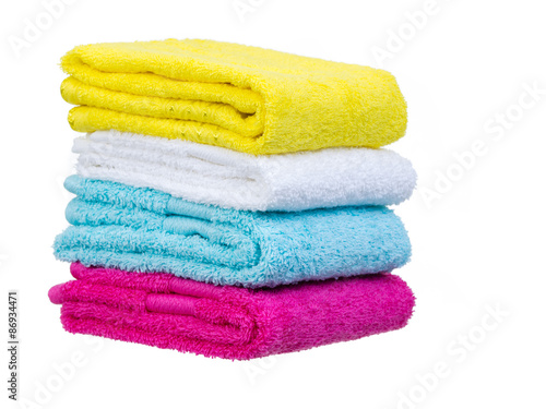 Fresh towels stack complete 3/4 view isolated on white background