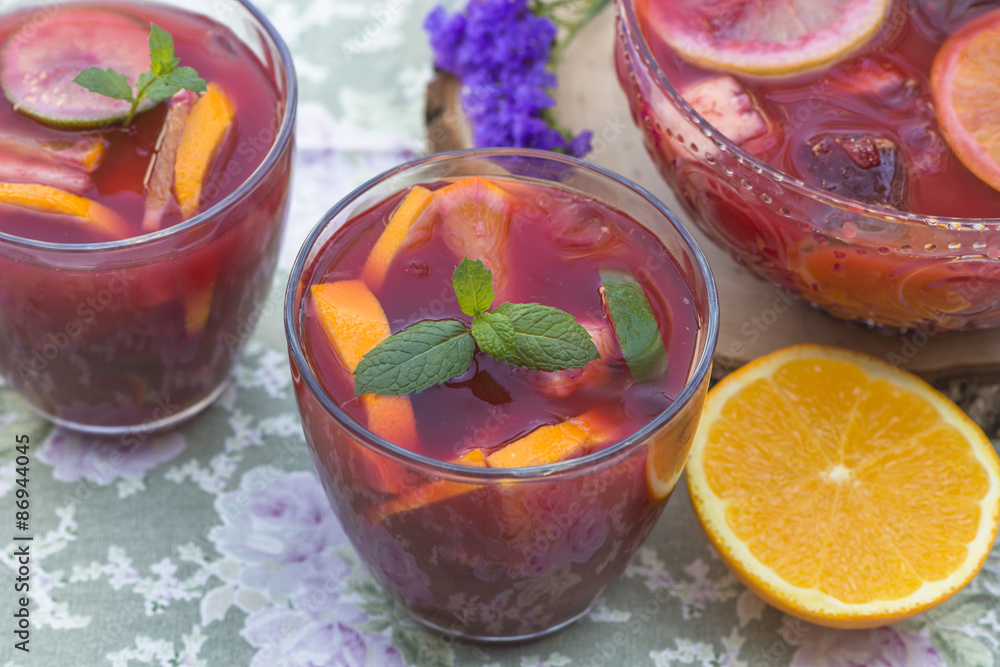 Refreshing red sangria with orange juice and fruit Refreshing red sangria with orange juice and fruit
