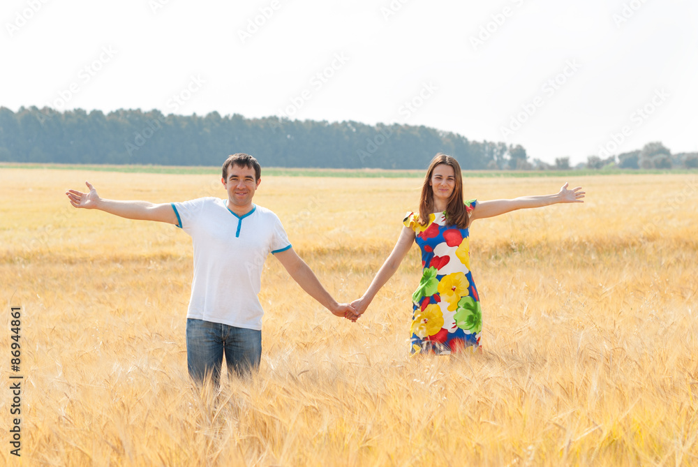 Happy couple in love in the field. Happy couple in love in the field.