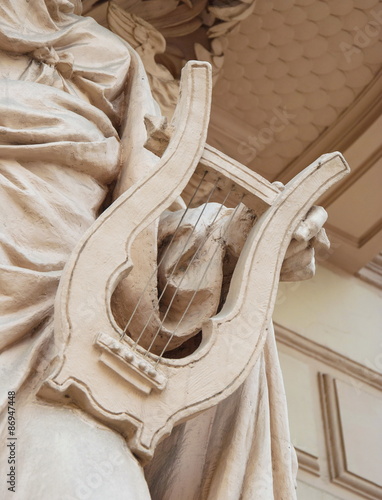 Detail of sculpture in the form of a harp or lyre photo