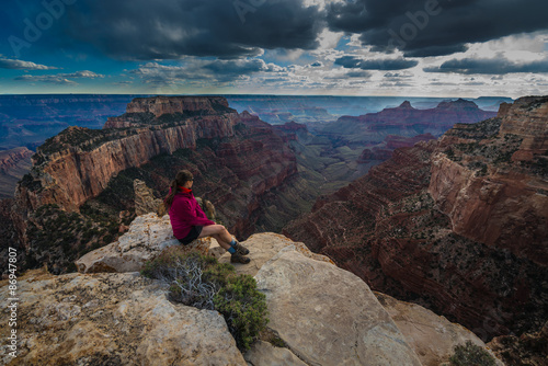 Hiker looking down Cape Royal Overlook Grand Canyon North Rim Wo