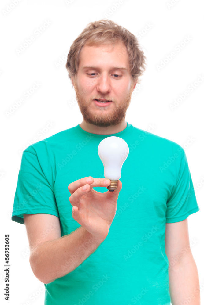 Bearded man holding an idea light bulb Bearded man holding an idea light bulb