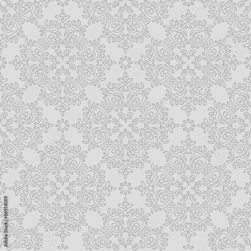 Seamless background made of exotic pattern in grey colors