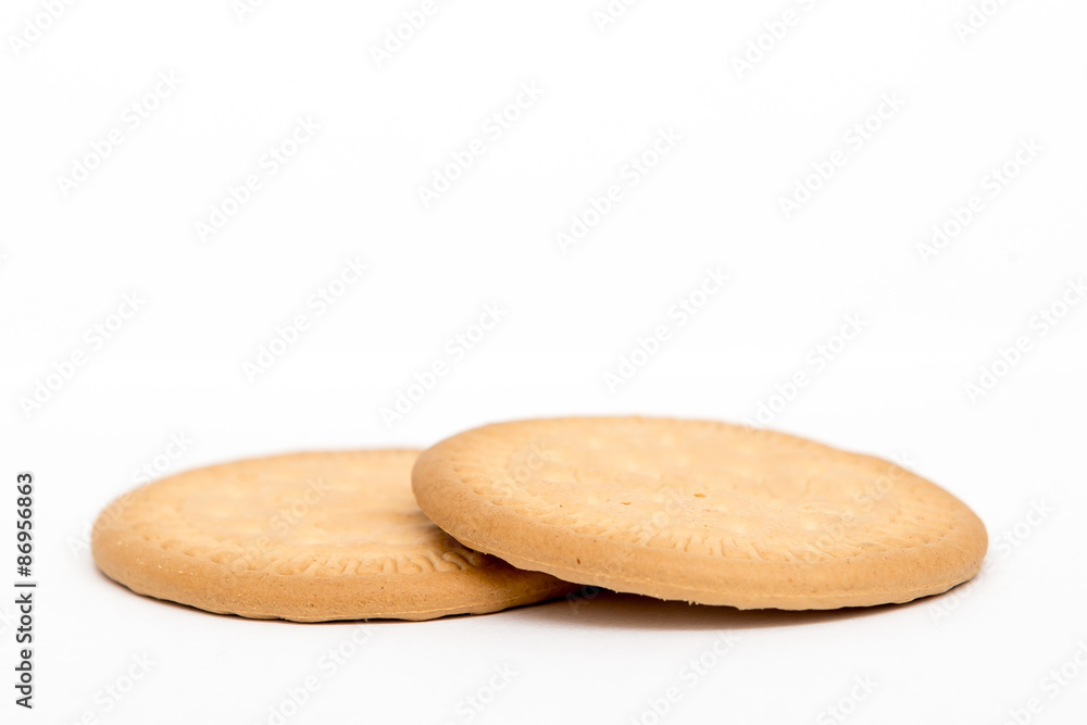 2 simple biscuits isolated on white 2 simple biscuits isolated on white