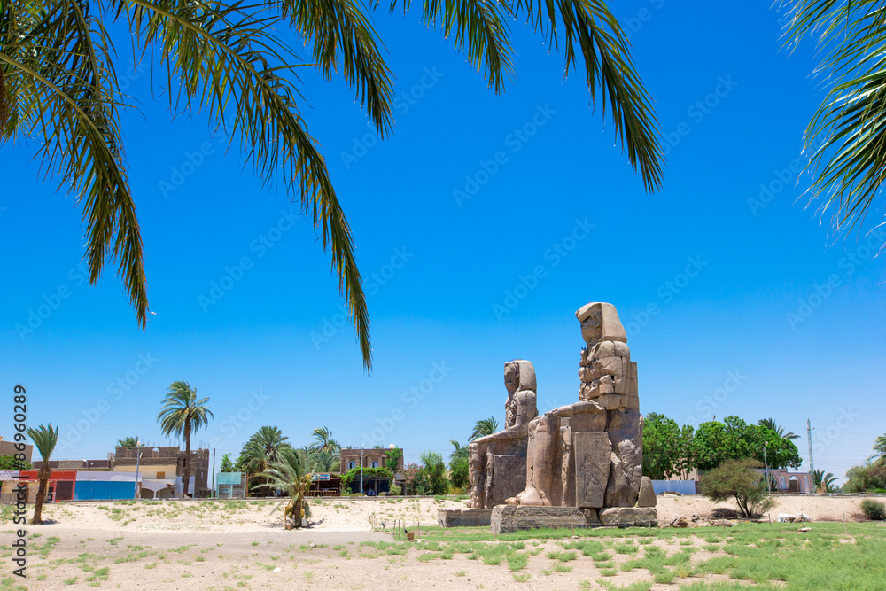Egypt. Luxor. The Colossi of Memnon - two massive stone statues